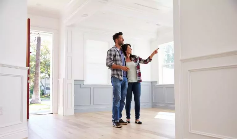 couple inside of new house