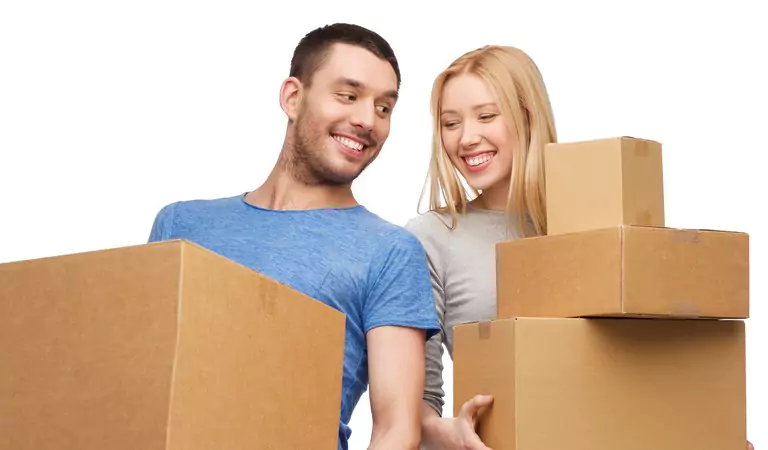 couple is ready to move with some cardboard boxes