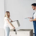 Woman moving and using boxes